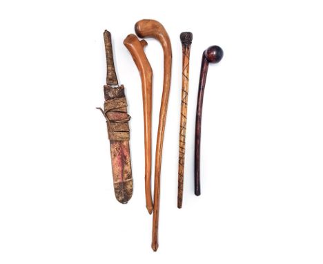 A MASAI DAGGER, KENYA in a leather sheath; and A Miscellaneous Collection of Hunting Sticks, approximately 67cm long  THE LAU