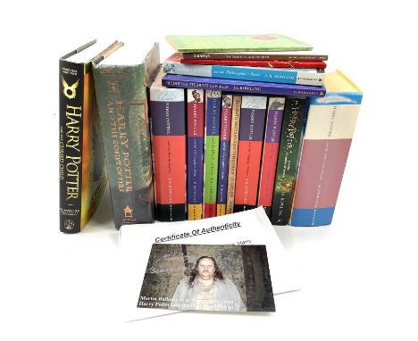 J. K. ROWLING. Fifteen books related to Harry Potter, including Harry Potter and the Chamber of Secrets, signed by Robert Har