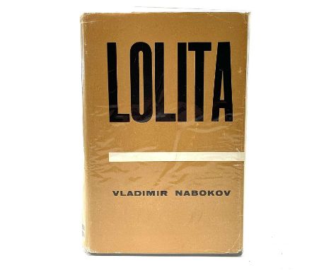 VLADIMIR NABOKOV. 'Lolita,' first English edition, original cloth, unclipped dj, nibbles to edge of dj, spotting to top of te
