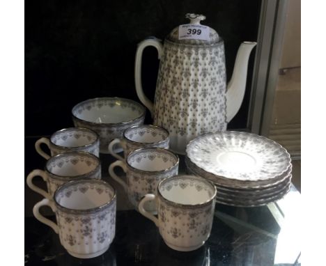 A Spode coffee set comprising coffee pot, six coffee cups and saucers, sugar bowl.