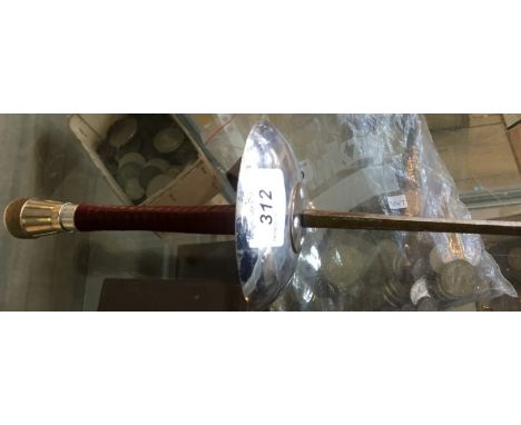 A vintage fencing sword and case.