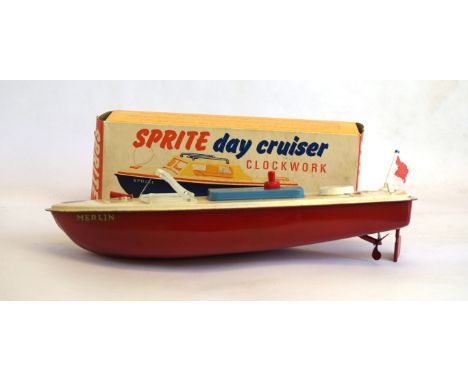 Two Sutcliffe boats, comprising boxed 'Sprite' daycruiser - cream, light green hull in card picture box - clockwork, and an u