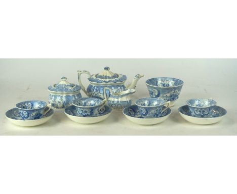 A Victorian blue and white child's miniature tea service comprising teapot, lidded sugar bowl, cream jug, four cups, four sau