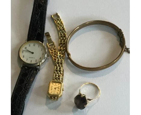 A mixed lot of assorted costume jewellery items, to include gold plated bangle, 9ct gold mounted dress ring, two watches to i