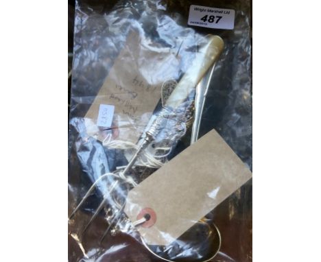 An 800 grade continental silver sauce ladle, a mother of pearl handled and silver pickle fork, together with further hallmark