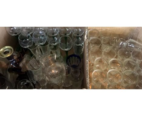 Two boxes of assorted glassware to include a good quality early 20th Century bohemian blue and clear faceted cut glass vase, 