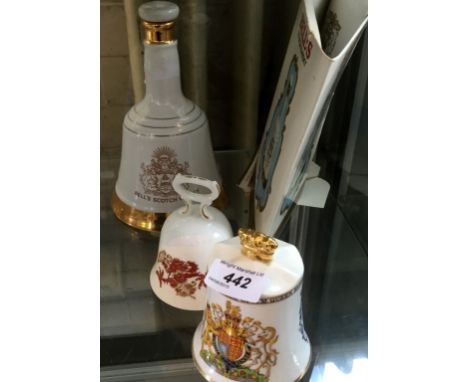 A Bells scotch whisky Wade decanter, still with original seal, Aynsley commemorative bell and a further Royal Staffordshire b