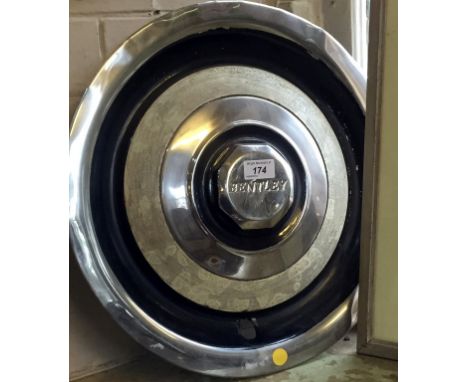 A vintage Bentley chrome and black painted wheel trim probably 1950's, diameter 44cm.