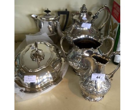 A Victorian silver-plated three piece tea service together with a silver-plated entree dish and hot water jug. 