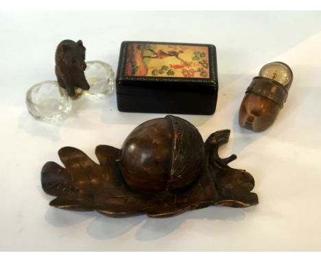 A mixed group of collectable items to include a black forest bear and cut glass open salt, a acorn ink stand, a black lacquer