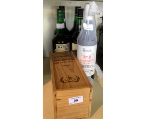 A mixed lot of assorted spirits to include a Harrods no.11 sheery, a cased bottle Ferreira vintage port circa 1980, hardys sh
