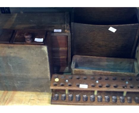 A mixed lot of assorted oak and hardwood items to include pipe rack, storage chest of two drawers, a tool chest, a two divisi