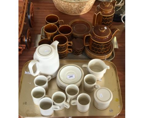 A Hornsea Studio Pottery tea service together with a further Hornsea Heirloom pattern tea service.
