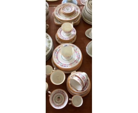 An early Royal Doulton fifty four piece tea and dinner service having floral decoration.