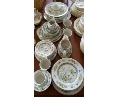 A Royal Doulton Tonkin fifty-four piece pattern tea and dinner service.
