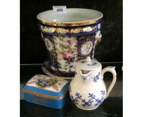 A 19th Century porcelain jug of baluster form decorated in blue floral design. together with a late 19th/early 20th Century F