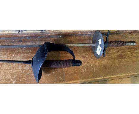 Two vintage fencing swords.