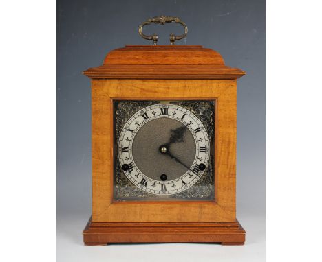 A 20th century walnut cased bracket style mantel clock by Perivale Clock Co, with eight day three train movement striking the