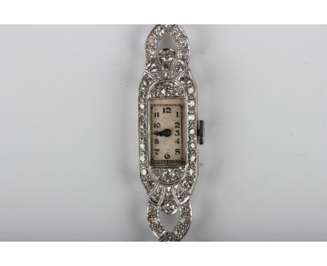 An Art Deco platinum cased and diamond set lady's bracelet wristwatch, the jewelled lever movement detailed 'Cyntax A.1 Swiss