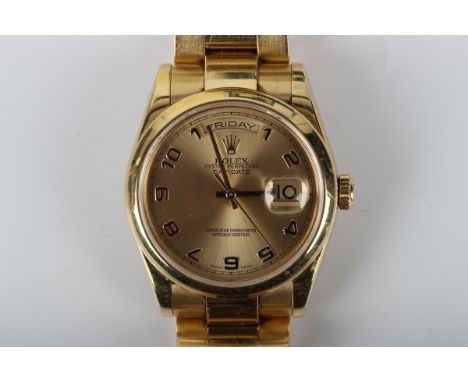 A Rolex Oyster Perpetual Day-Date 18ct gold cased gentleman's bracelet wristwatch, circa 2001, Model No. 118208, Serial No. K