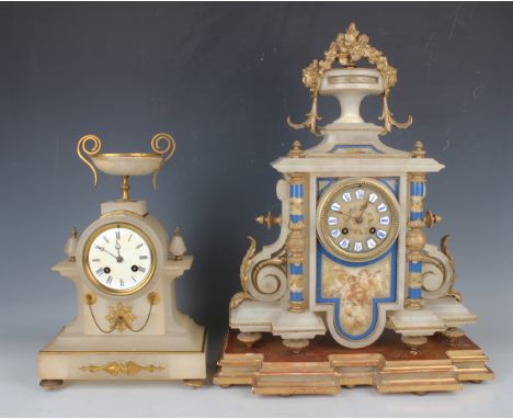 A late 19th century gilt metal mounted alabaster mantel clock with eight day movement striking on a bell, the dial with appli