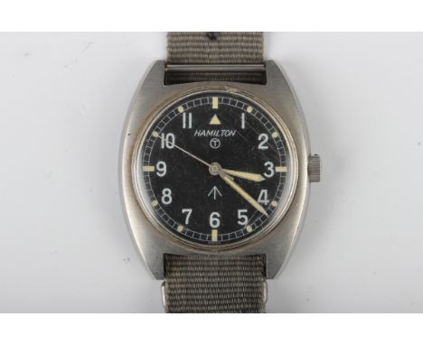 A Hamilton MoD issue steel cased gentleman's wristwatch, the signed black dial with Arabic hours, centre seconds and MoD arro