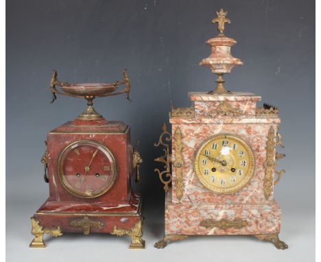 A late 19th century rouge marble and gilt metal mantel clock with eight day movement striking on a bell, the case with tazza 