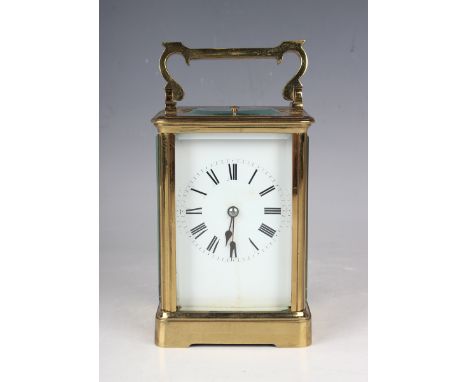 An early 20th century French lacquered brass cased carriage clock with eight day movement striking hours and half hours and r