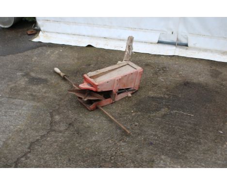 A vintage broadcast seed sower. With wooden frame and metal disc, L100cm.