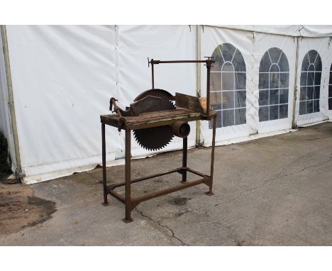 A vintage circular saw bench. L111cm x D65cm x H152cm