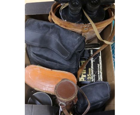 Assorted binoculars and a camera