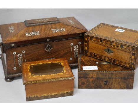 A mother of pearl inlaid tea caddy and three boxes