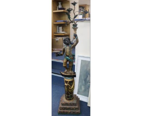 A pair of blackamoors and candelabra, H.159cm