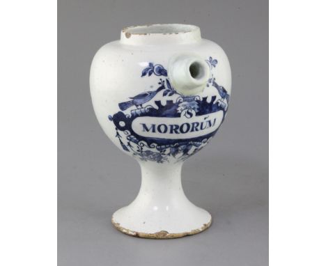 An English delftware blue and white wet drug jar, c.1690-1700, painted with the title MORORUM in a cherub head and peacock ca