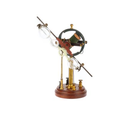 Geissler Tube &amp; Rotator, German, C.1900, label to underside of base , turned wooden base with terminals for low voltage t