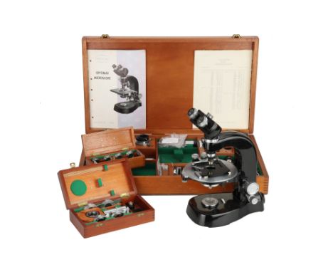 An Extensively Well Equipped Beck Optomax Research Binocular Microscope, English, dated 1964 ( on the instruction manual) eng