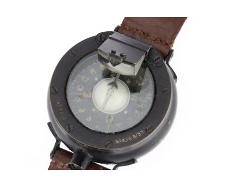 A British Royal Flying Corps Pilots Compass, engraved to the bezel 'PATT 261 No. 436 B/53', in black with leather strap, the 