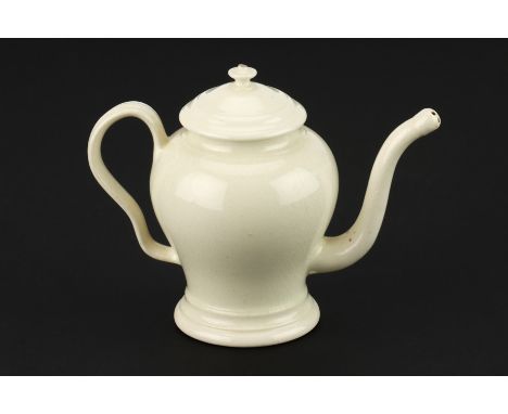 A creamware ‘Bubby’ pot, English, 1770-1835, possibly by Wedgwood, creamware, of teapot form with lid and perforated spout en