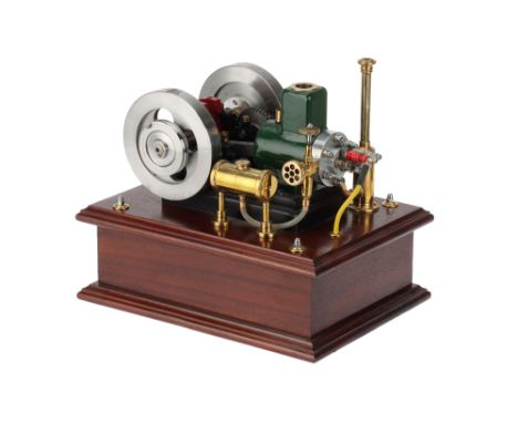 the engine with mounted on a polished oak base, with counterweight open crank, twin drilled disk flywheels, 1 with a pully th