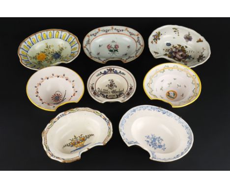 A Collection Of Eight Barber’s Shaving Bowls, European, 19th Century, glazed earthenware, in typical bowl form (three circula
