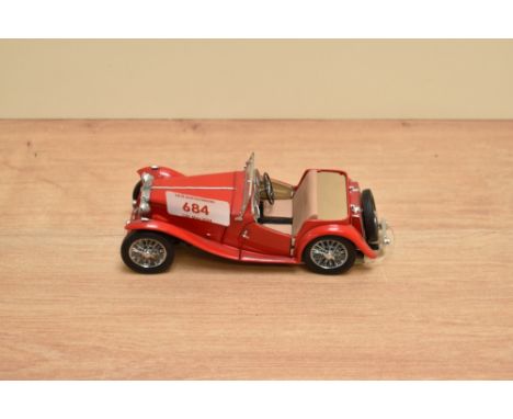 A Franklin Mint 1:24 scale Die-cast, 1948 MGTC Roadster with tag and certificates, in card box with polystyrene cradle