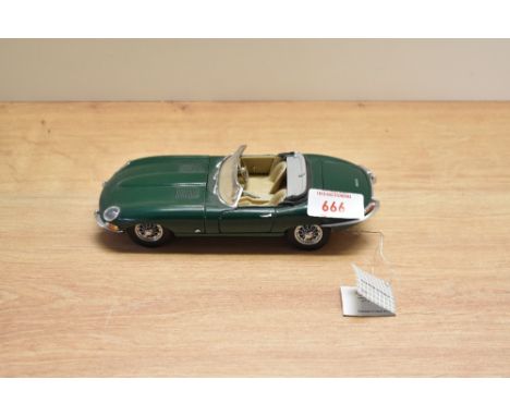 A Franklin Mint 1:24 scale Die-cast, 1961 Jaguar E-Type with tag and certificates, in card box with polystyrene cradle