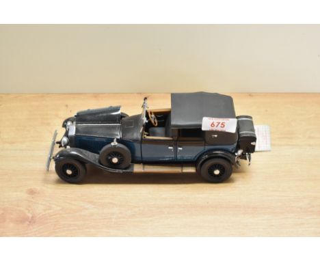 A 1988 Franklin Mint 1:24 scale Die-cast, 1929 Rolls Royce Phantom I with tag and certificates, in card box with polystyrene 