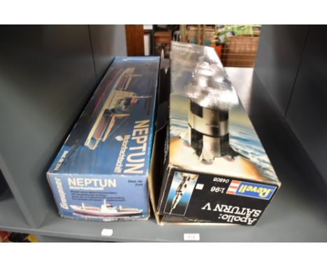 Two Model Kits, Revell 1:66 scale 04805 Apollo Saturn V and Graupner 2144 Neptun Cargo Motor Ship, both boxed, both appear un