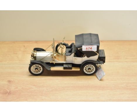 A 1991 Franklin Mint 1:24 scale Die-cast, 1912 Pickard Victoria with tag and certificates, in card box with polystyrene cradl