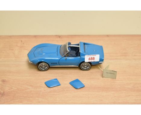 A 1989 Franklin Mint 1:24 scale Die-cast, 1968 Corvette with tag and certificates, in card box with polystyrene cradle