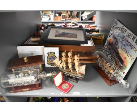 A shelf of Railway Prints, Reproduction Aimer's Coffee Essence Advertising Sign, Trains in Bottles, Cupro-nickel Medallion et