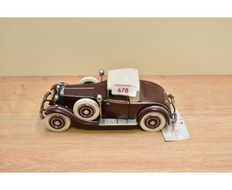 A Franklin Mint 1:24 scale Die-cast, 1925 Hispano-Suiza Kellner H6B with tag and certificates, in card box with polystyrene c