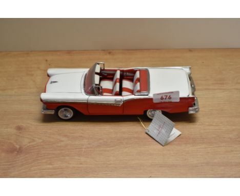 A Franklin Mint 1:24 scale Die-cast, 1957 Ford Skyliner with tag and certificates, in card box with polystyrene cradle