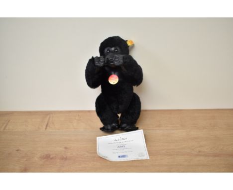 A modern Steiff Bear, 660634 Gorilla with yellow tag and button, in pull string bag